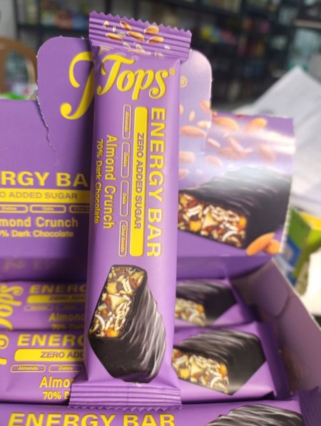 بار الطاقة Topsباللوز والشوكولاته الغامقة 70٪بدون سكر مضاف 50غم